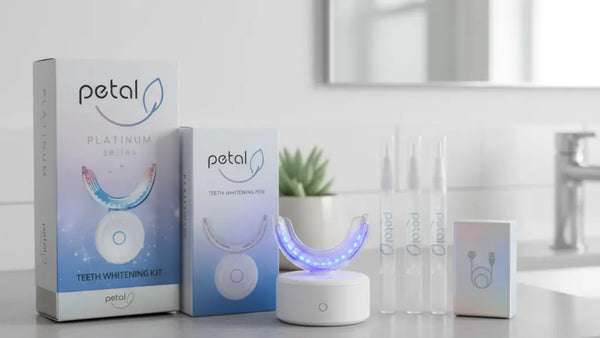 LED teeth whitening device on minimalist bathroom surface