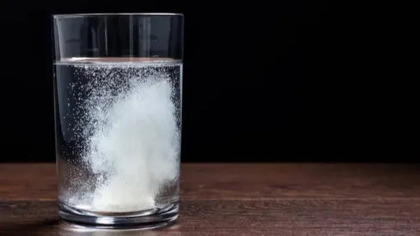 Retainer cleaning pod dissolving in warm water for dental hygiene